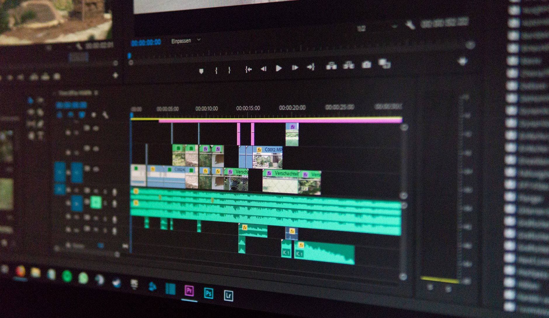 A video editing timeline displayed across a monitor during post-production